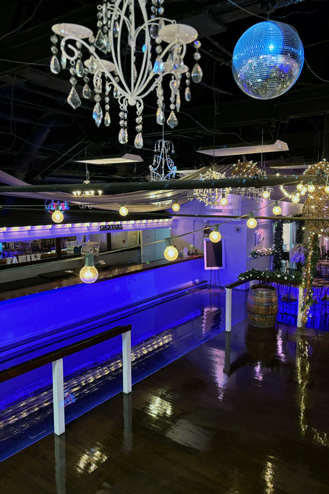 Corporate event venue ballroom with customizable ambient and accent lighting